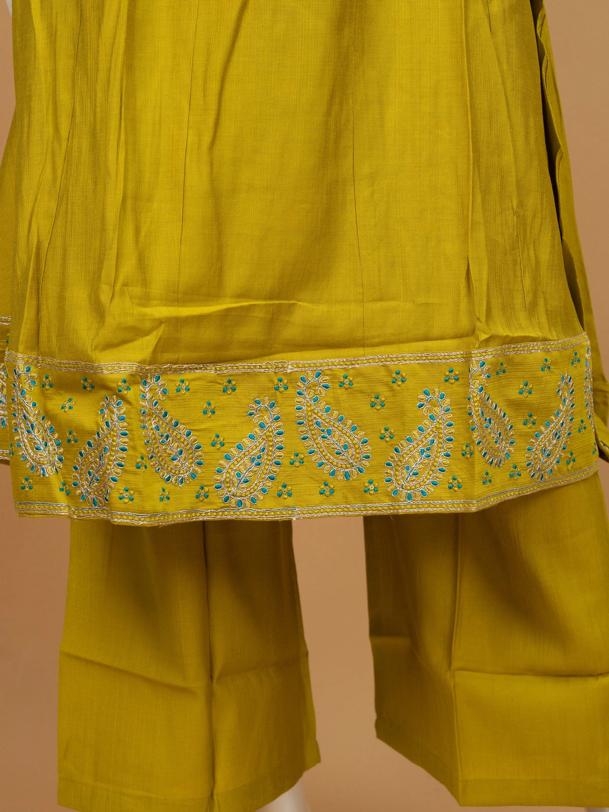Mustard Yellow embroidered art silk A-line kurti set with turquoise neckline embroidery and paisley print dupatta