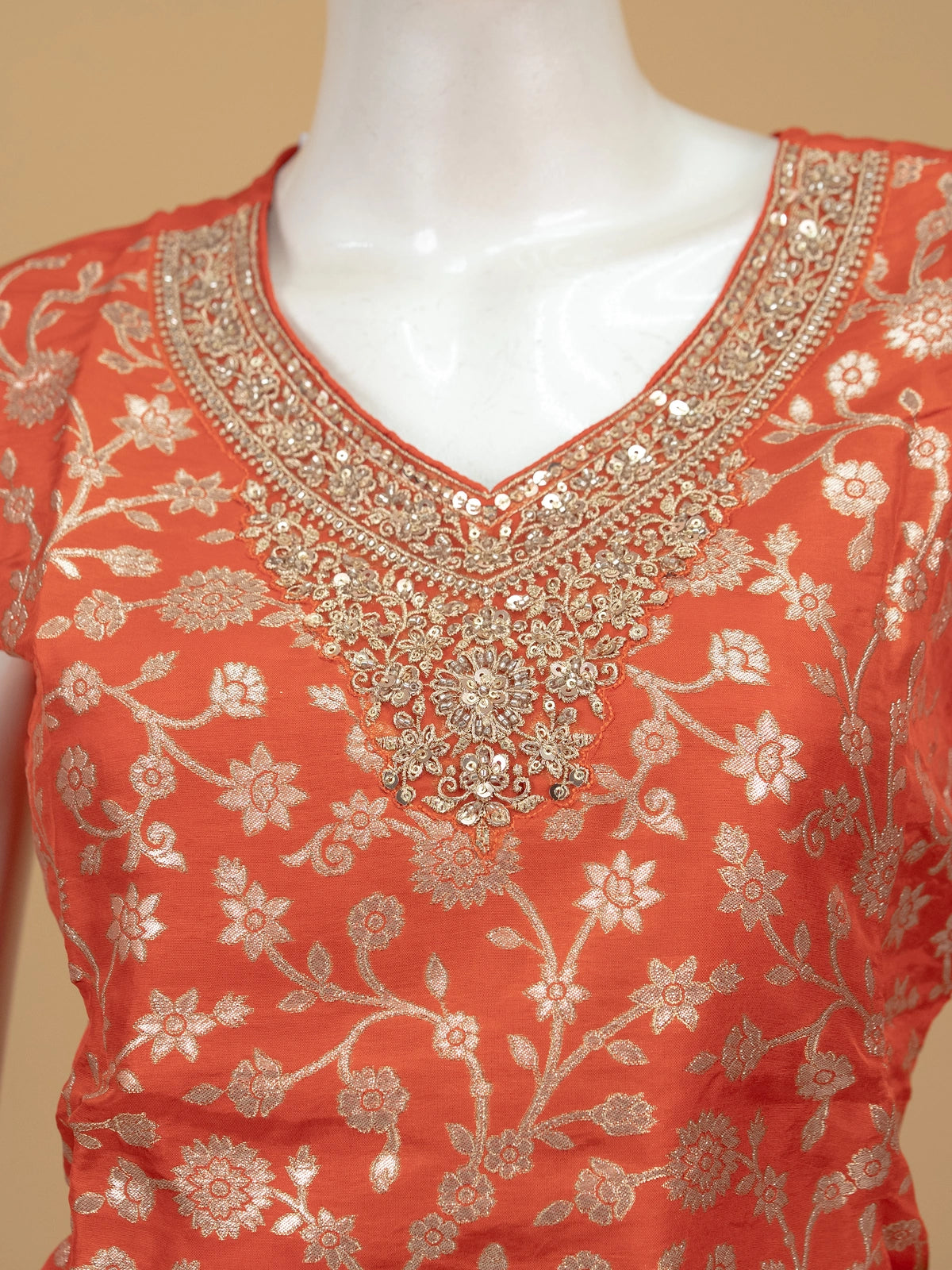 Orange floral zari silk embroidered straight cut kurti top with embellished neckline