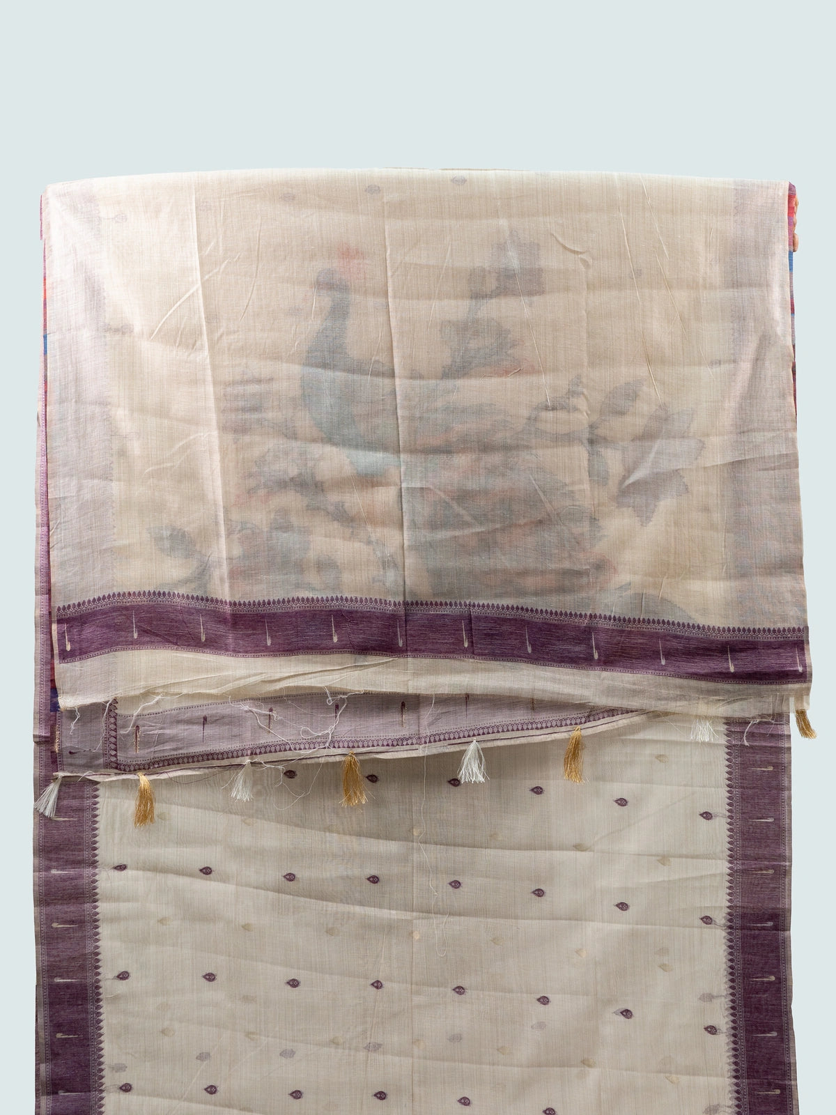 Cream linen cotton saree with lavender contrast border and multicoloured peacock pallu