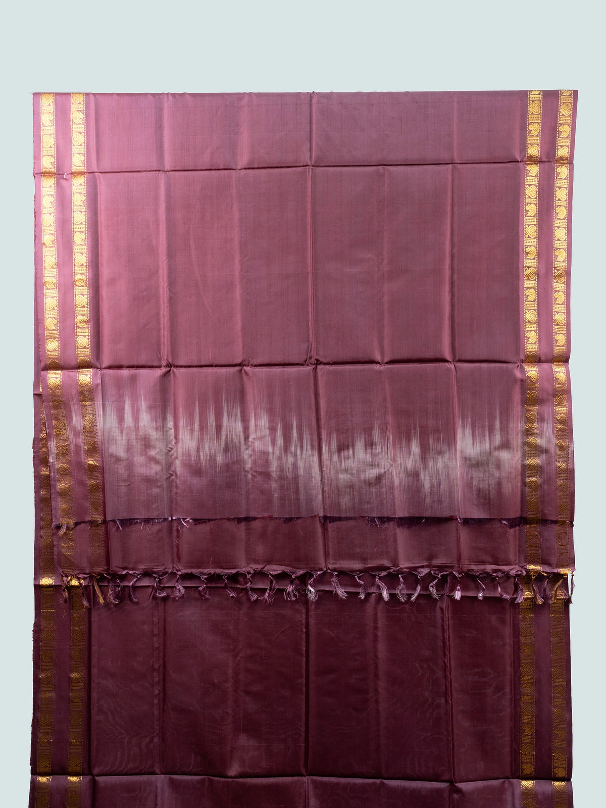 Wine maroon banana silk saree with gold zari border, silver buttas and contrast black blouse