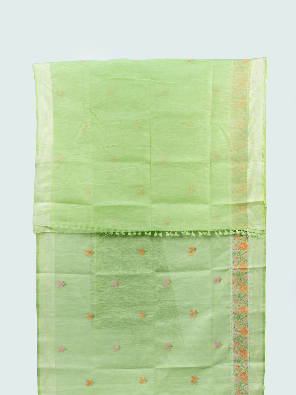Pista green linen cotton saree with pink and orange floral embroidery and silver zari border
