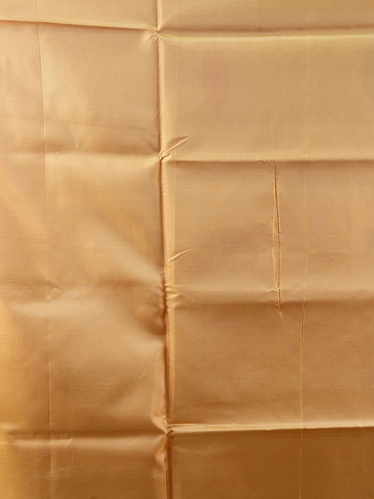 Mauve-grey dual-tone Banana Silk saree with gold zari butis and a contrast mustard pallu