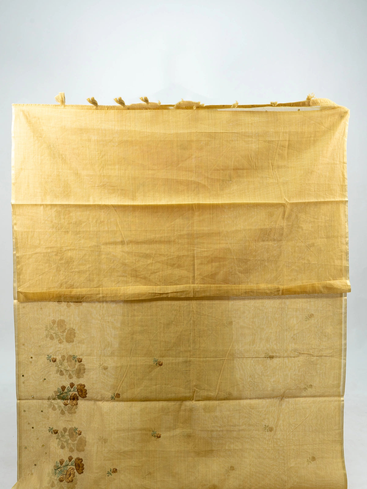 Yellow linen cotton saree with floral embroidered buttas and contrast black blouse