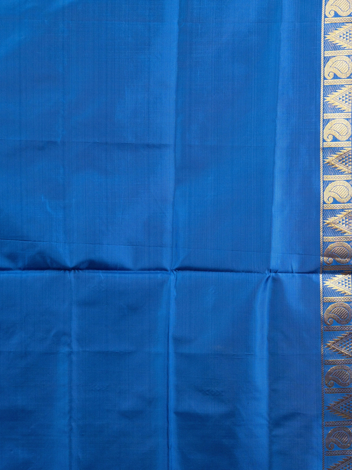 Cream Banana Silk saree with contrast blue pallu and gold zari border