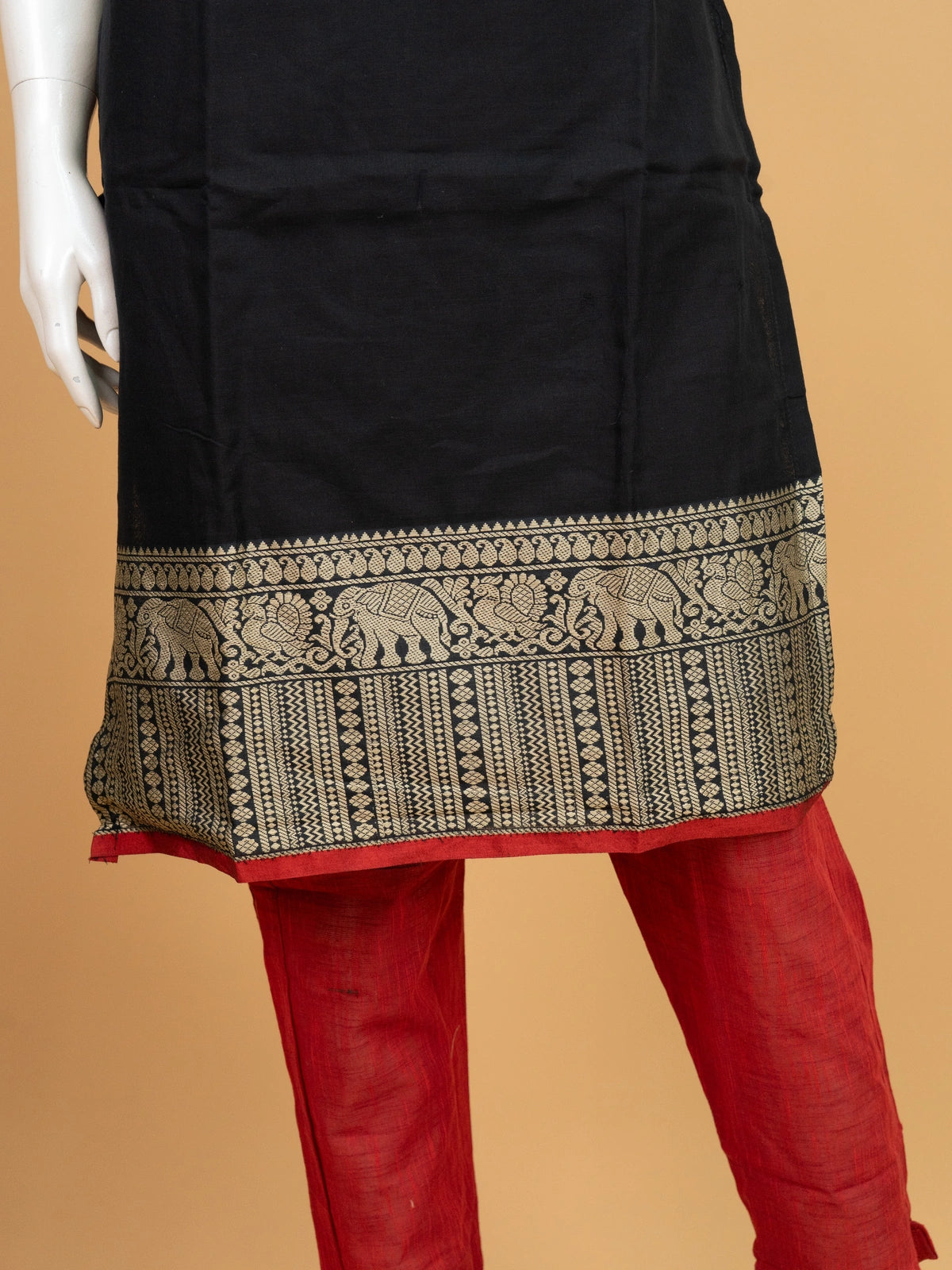 Black cotton silk straight cut kurti set with gold zari border, red contrast pants and dupatta
