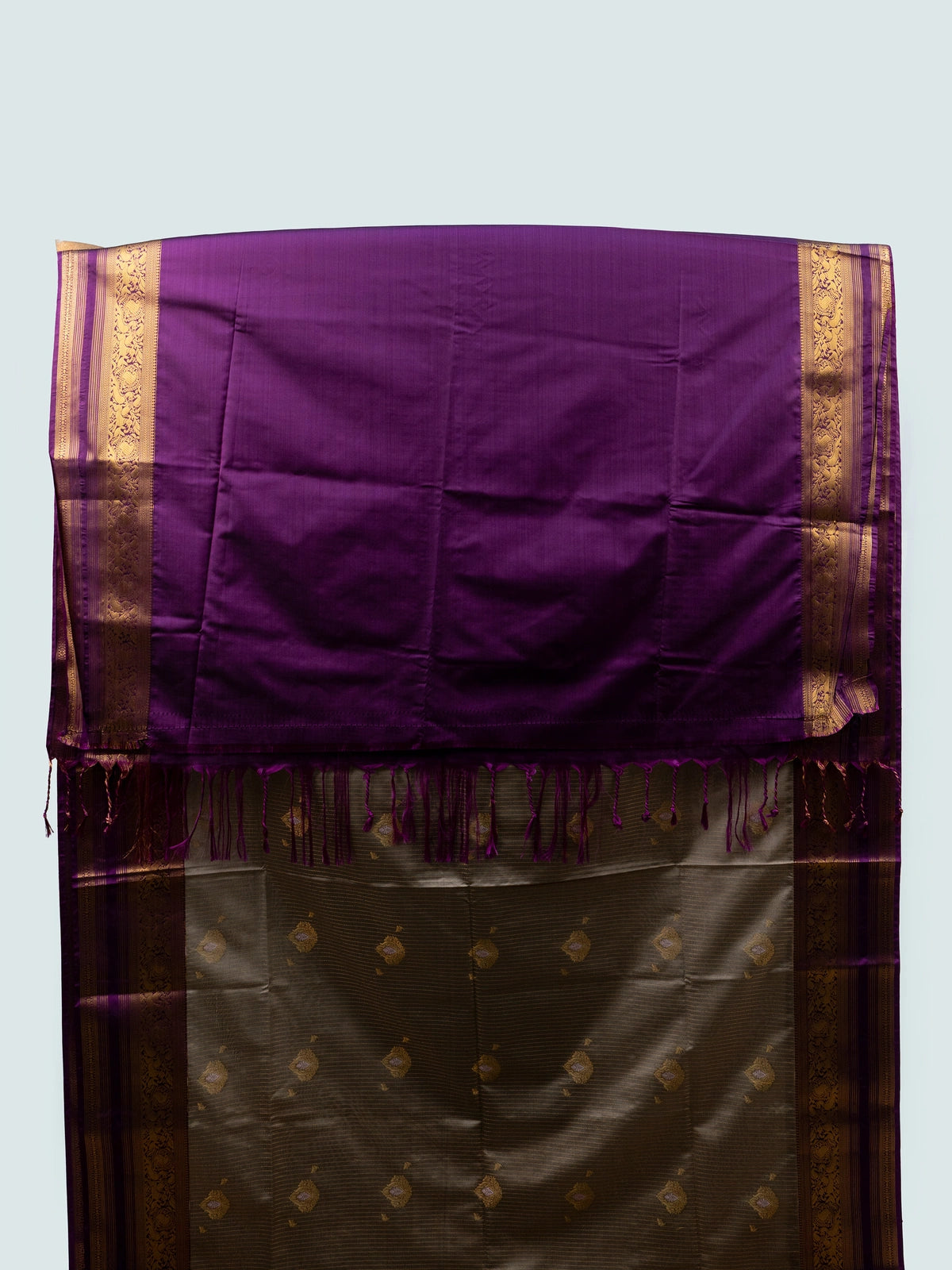 Taupe semi silk saree with Vaira Oosi needle-line weave and contrast purple gold zari border
