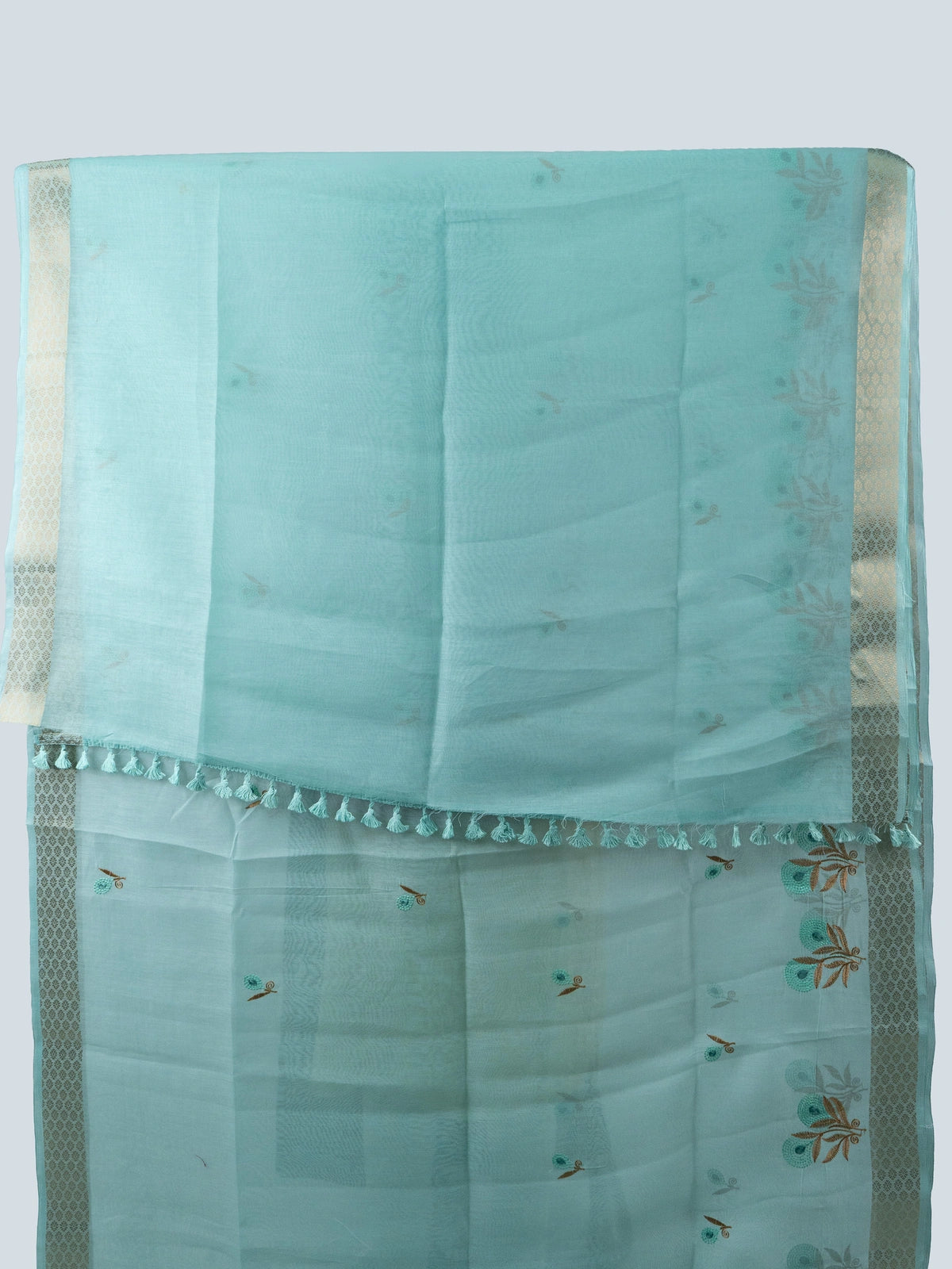 Sky blue linen cotton saree with gold zari border and embroidered floral buttas