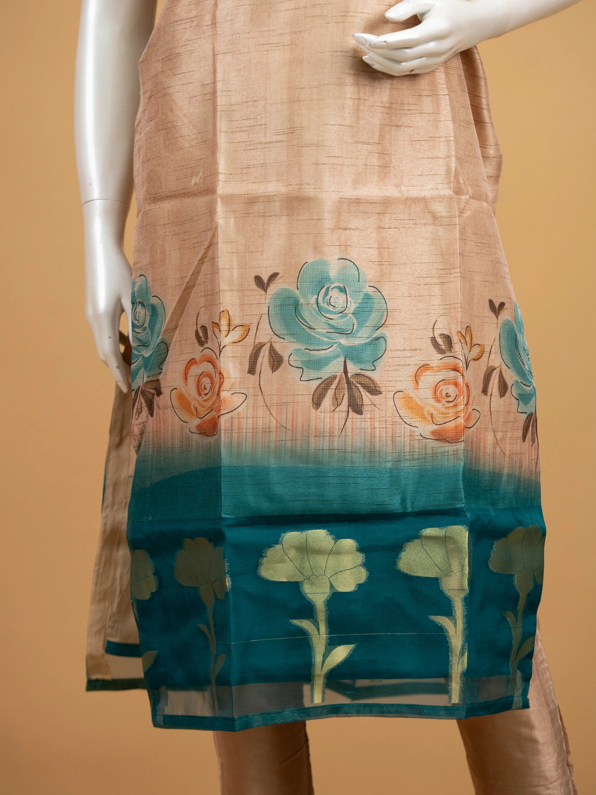 Beige floral raw silk straight cut kurti set with mirror work neckline, teal border and matching dupatta