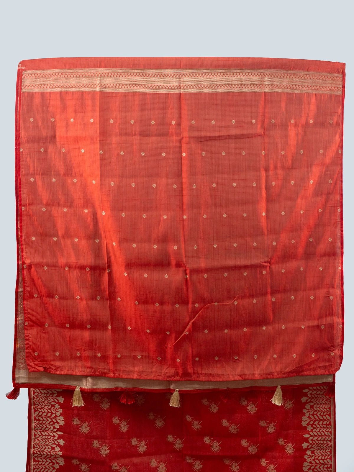 Red semi raw silk saree with gold zari butas, leaf-vine border and multicoloured floral pallu