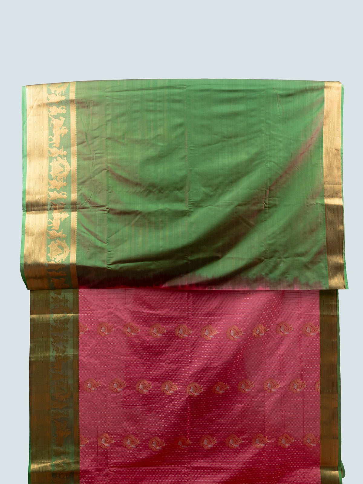 Pink soft silk saree with green and gold zari contrast border and floral brocade pallu