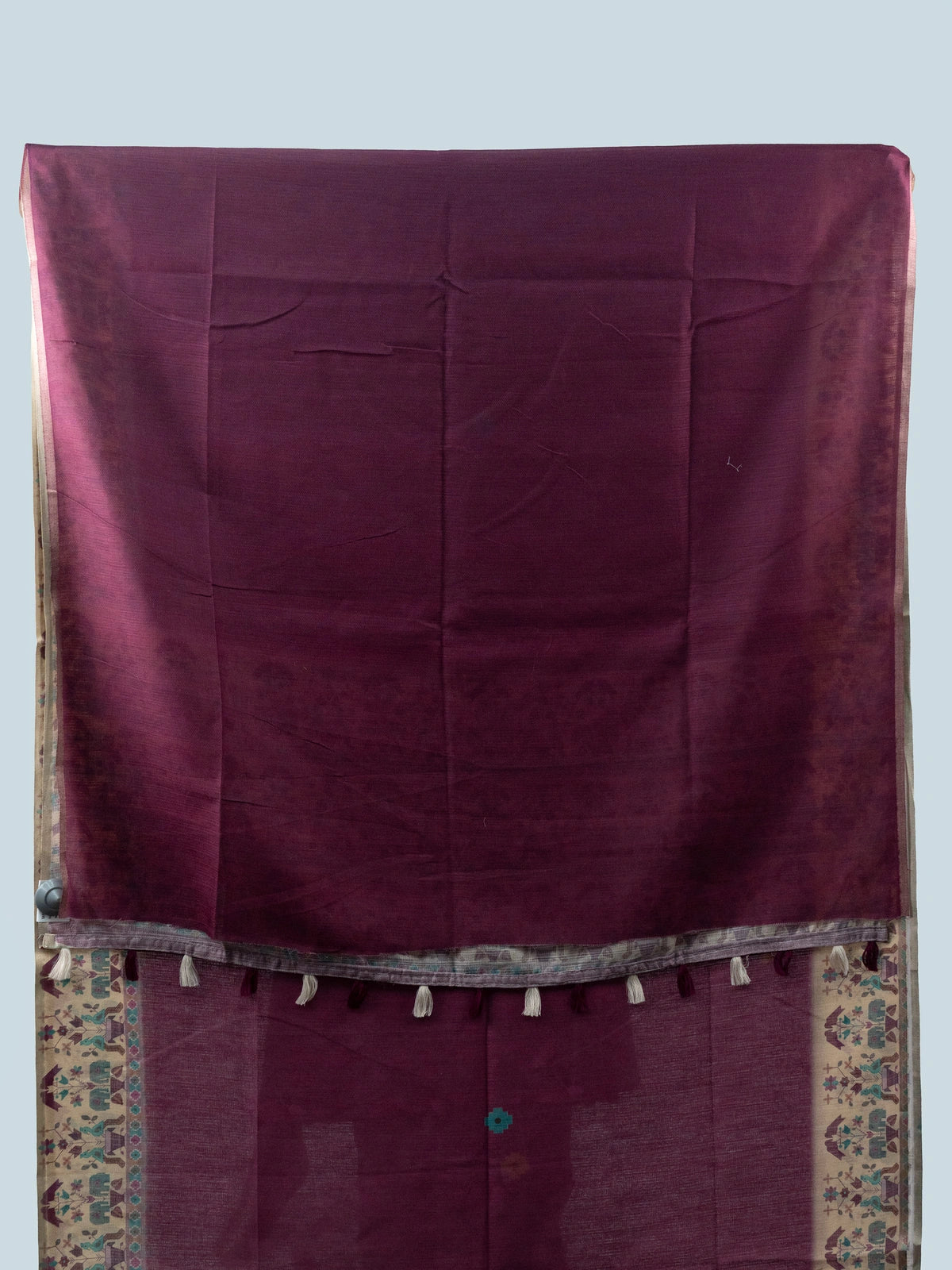 Wine purple linen cotton saree with beige folk-art elephant border and black embroidered blouse
