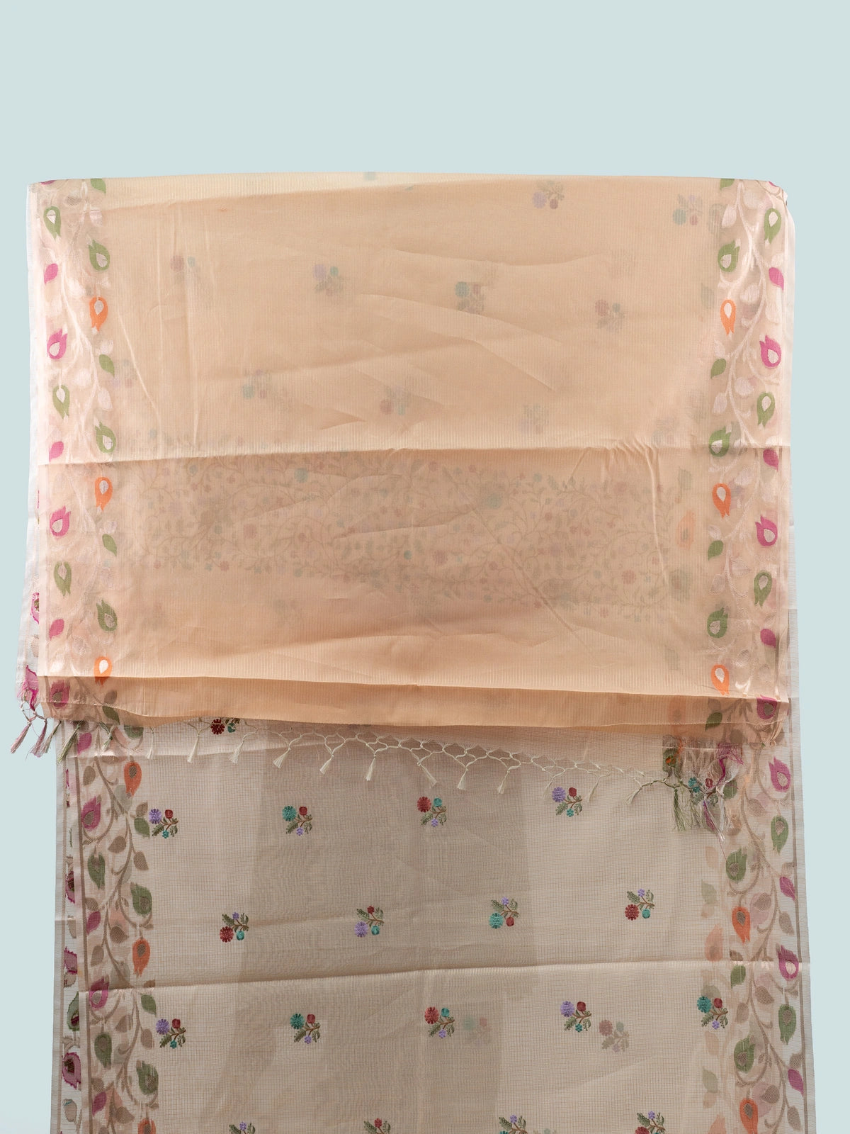 Peach linen cotton saree with multicolour floral embroidery, kota-check texture and paisley border with black embroidered blouse