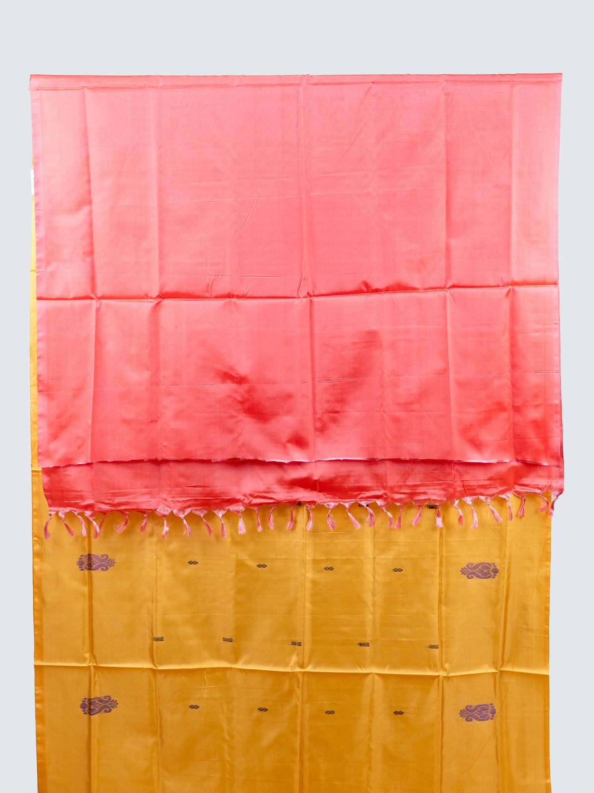 Mustard yellow banana silk saree with contrast pink pallu, purple paisley butis and gold zari work