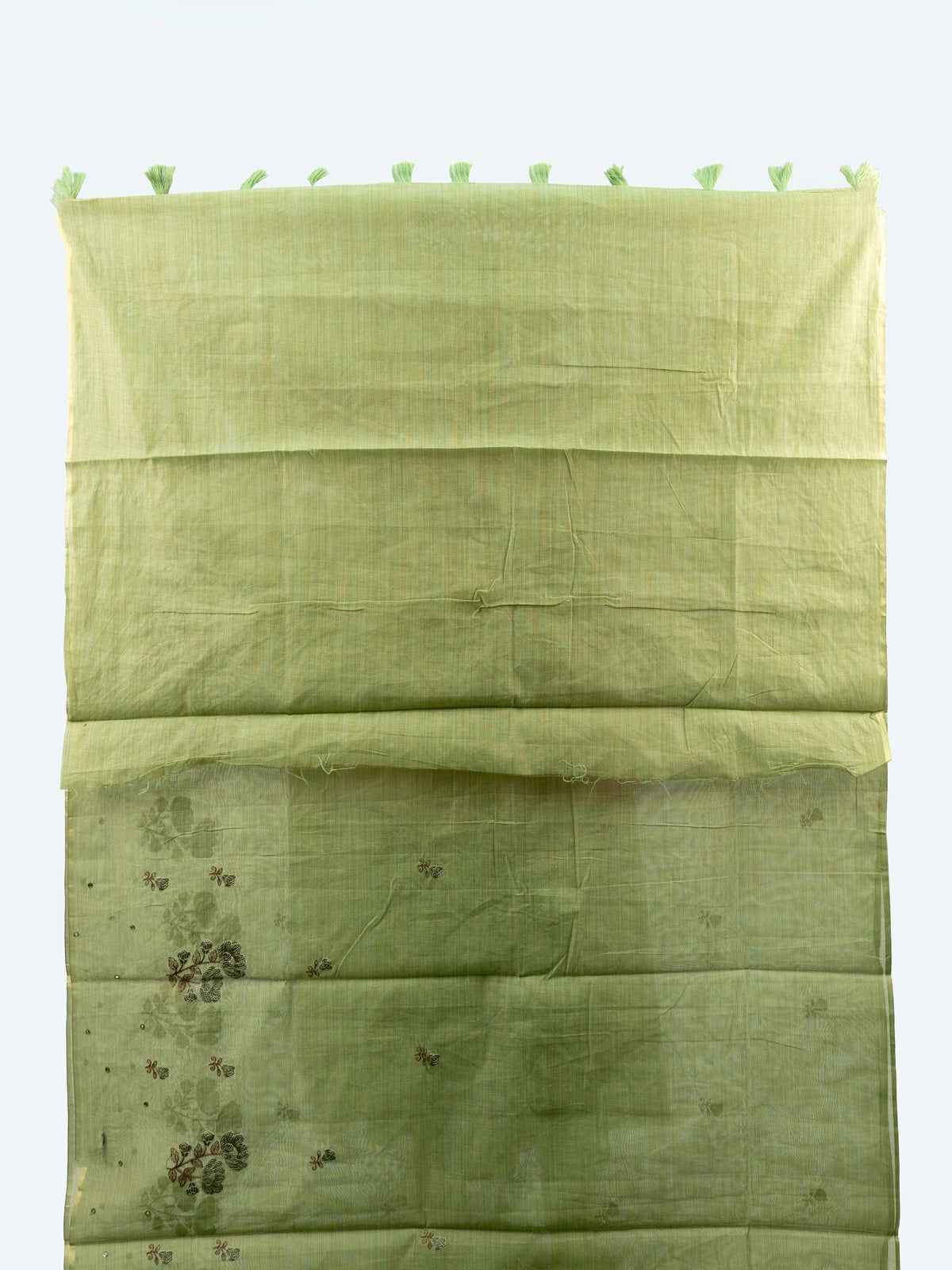 Mehndi green linen cotton saree with floral embroidery and tasselled pallu