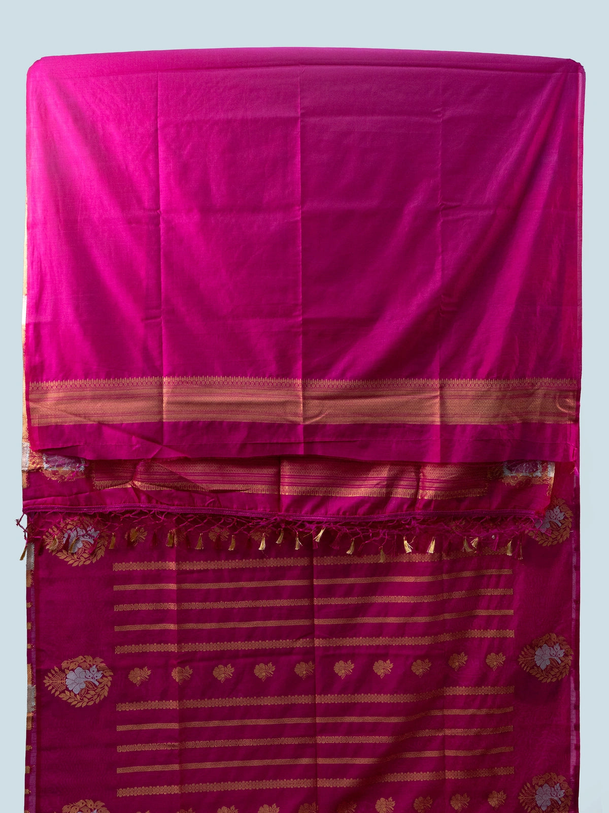 Magenta pink semi raw silk saree with gold zari floral motifs and brocade pallu