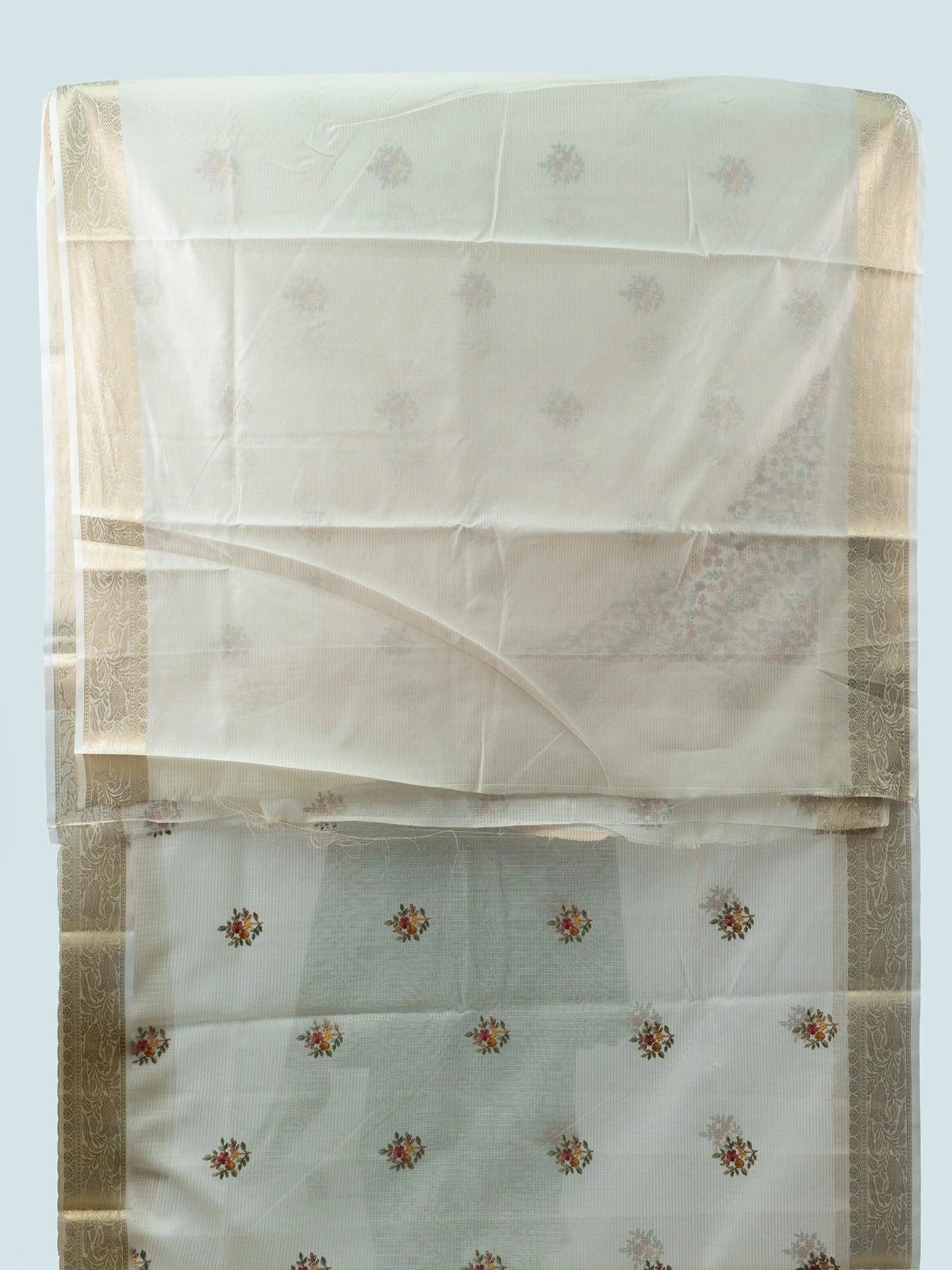 Cream linen cotton saree with gold zari border and multicolour floral embroidery
