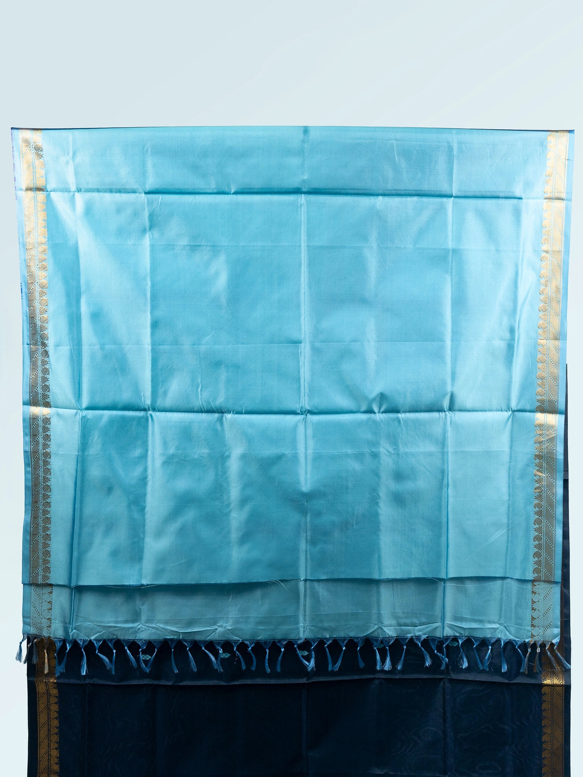 Navy blue Banana Silk saree with sky blue contrast pallu and gold zari border