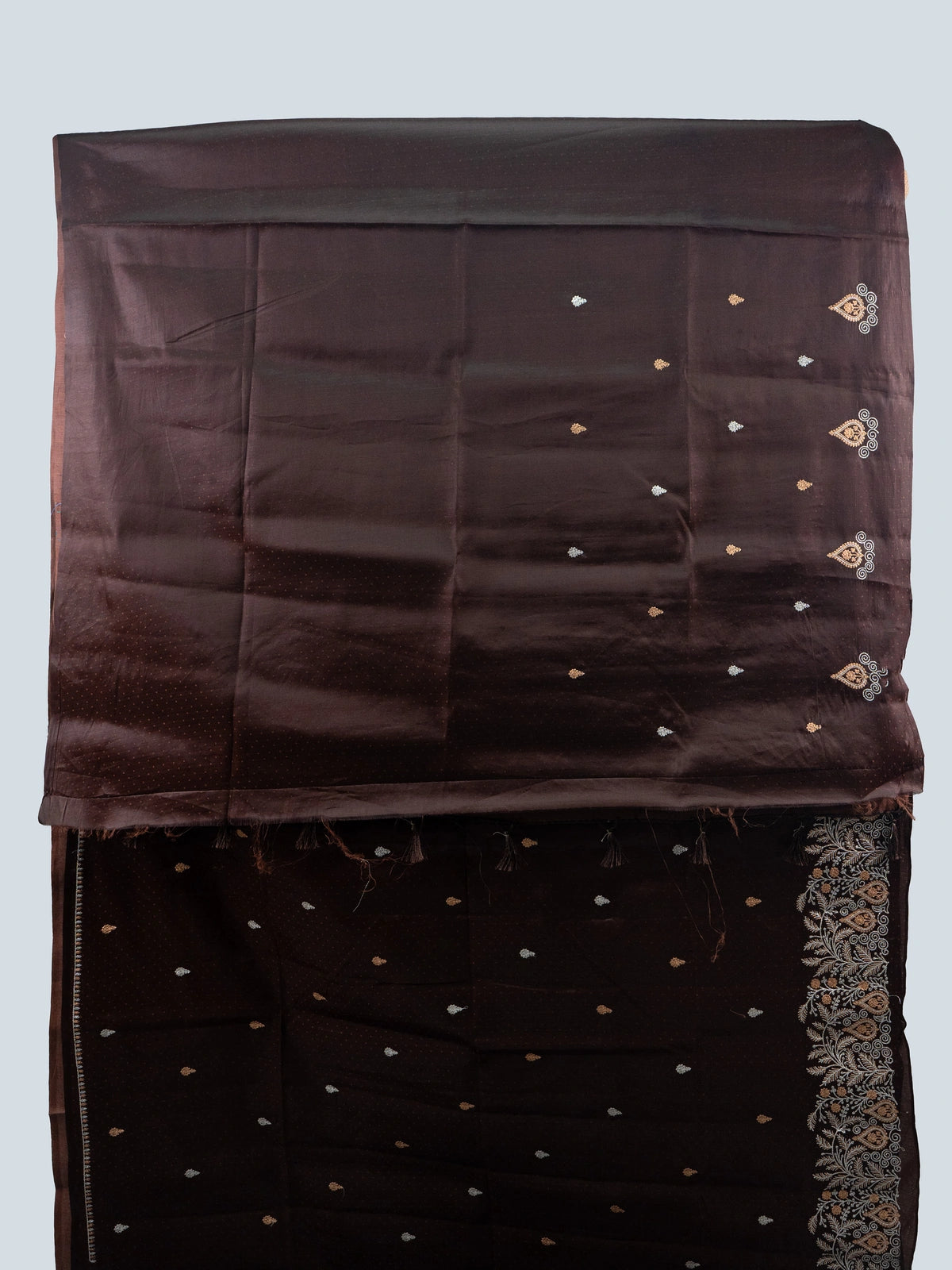 Dark chocolate brown semi raw silk saree with embroidered floral pallu and contrast black blouse