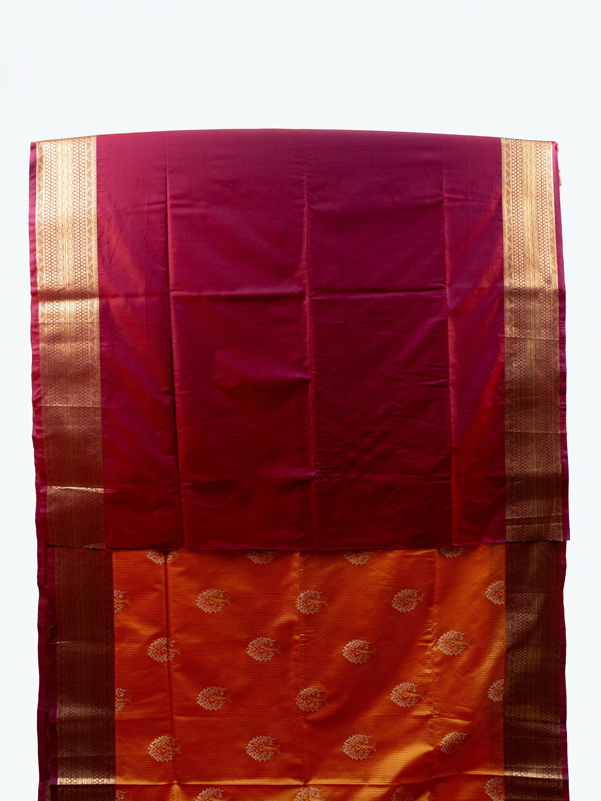 Orange and magenta Vaira Oosi Design semi silk saree with gold zari contrast border and floral buttas