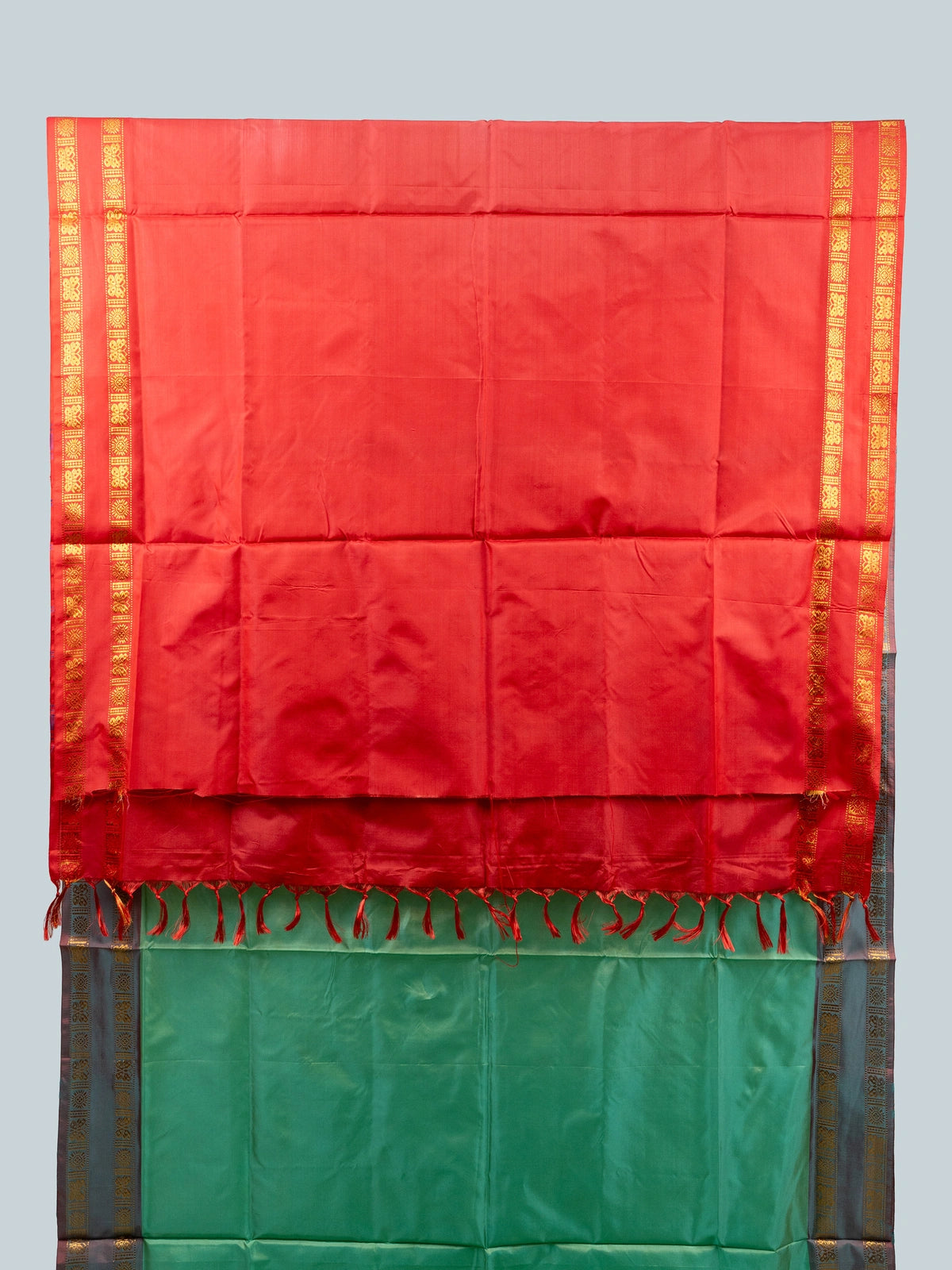 Sea green banana silk saree with contrast red pallu and gold zari border