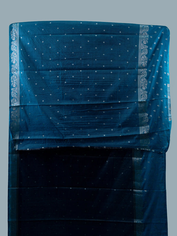 Teal blue semi raw silk saree with silver zari buttis and floral zari border