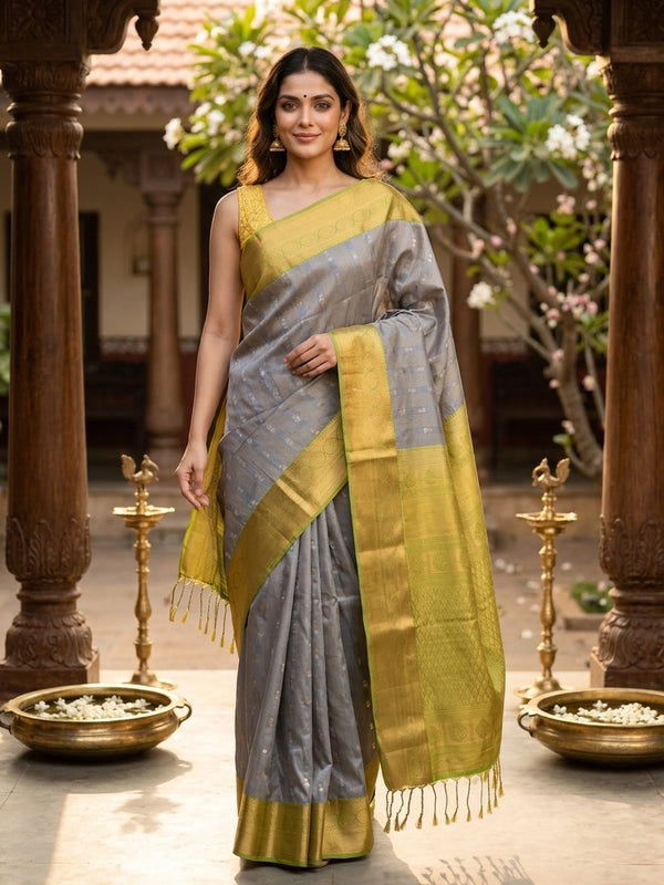 Grey Kanchipuram fancy silk saree with lime green and gold contrast zari border and buttas