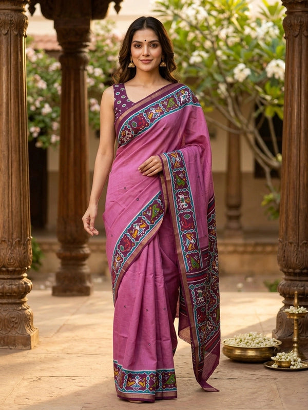 Mauve pink linen cotton saree with contrast maroon patola-print border, mirror work and multicolour ikat pallu