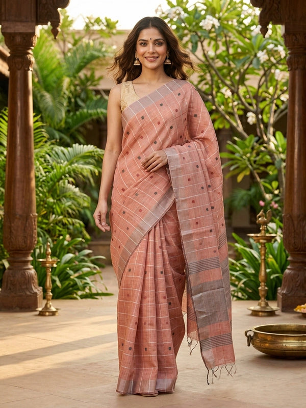 Peach and grey linen cotton saree with woven checks, buttis and contrast border