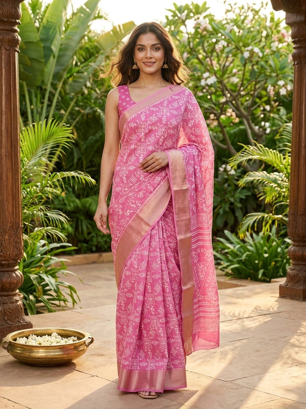 Pink and white batik print cotton designer saree with gold zari border