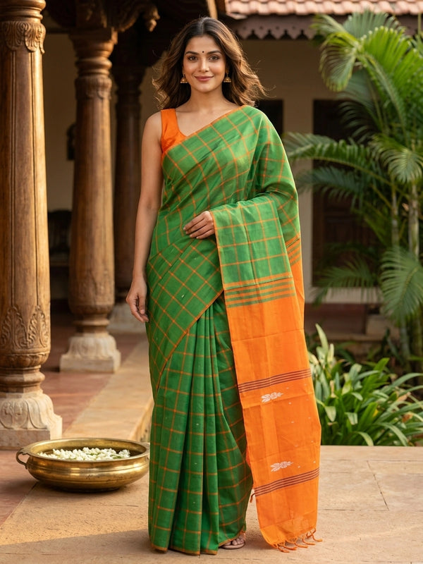Green and orange checked banana silk saree with contrast orange pallu and blouse