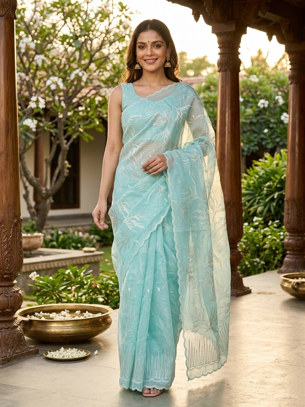 Aqua sea green organza designer saree with silver leaf embroidery and scalloped border