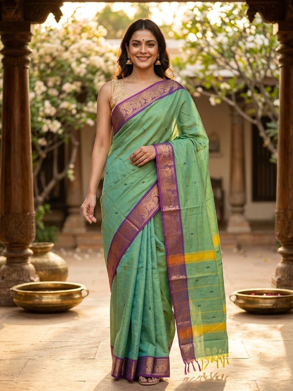 Green Chettinad cotton saree with contrast purple gold zari border and striped pallu