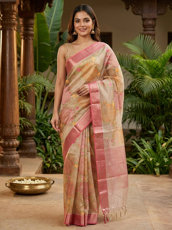 Beige and pink semi raw silk saree with multicolour floral embroidery and contrast zari border