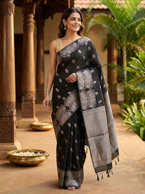 Black silk cotton saree with silver zari floral buttas and diamond-woven contrast pallu and border
