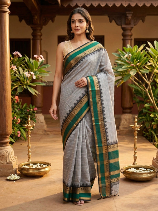 Grey Chettinad cotton saree with fine white stripes and contrast green gold zari temple border