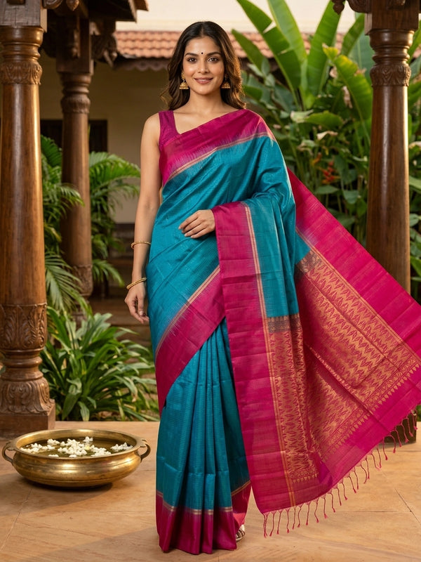 Peacock blue soft silk saree with contrast pink gold zari temple border and pallu