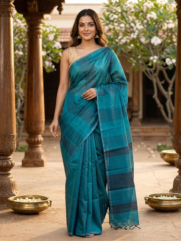 Teal blue silk cotton saree with tonal checks and contrast dark navy border