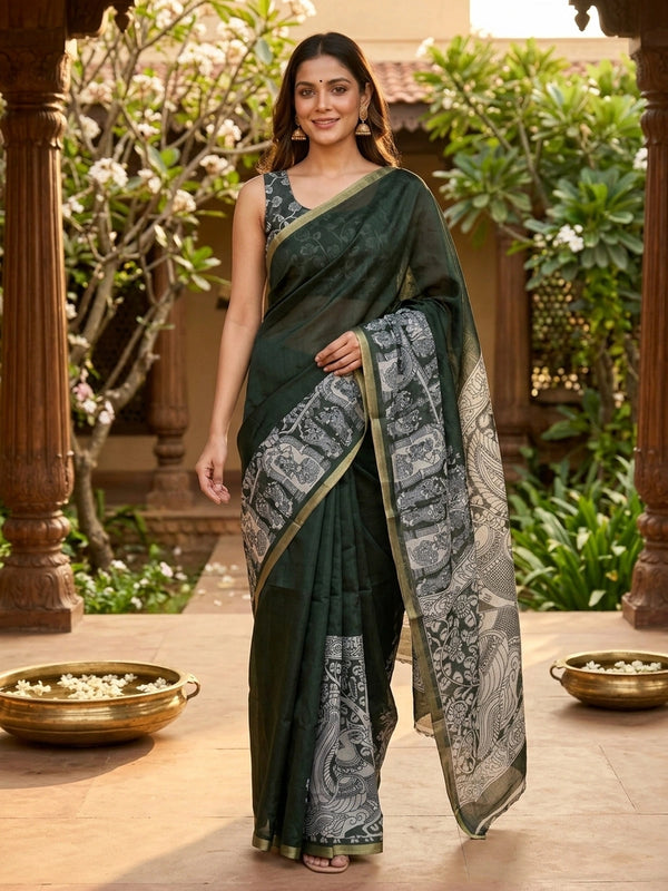 Dark green linen cotton saree with off-white Kalamkari peacock and floral printed pallu and gold zari border