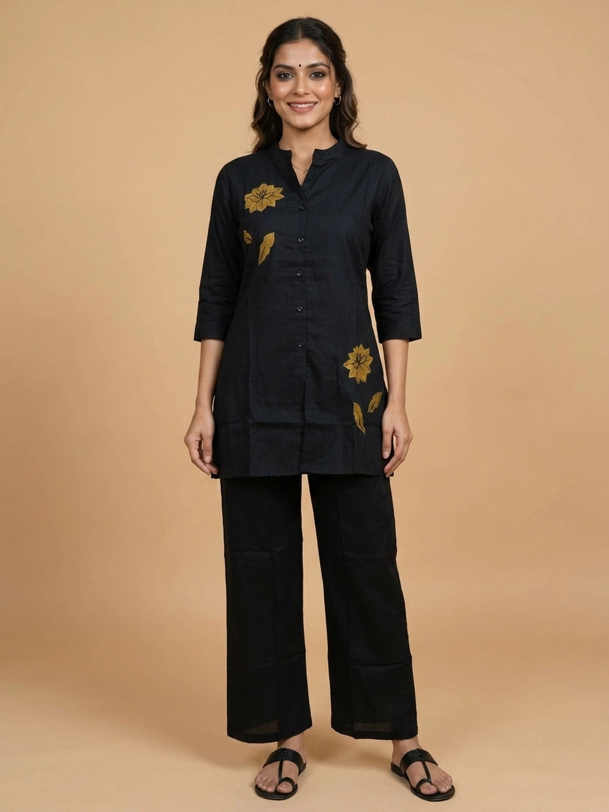 Black cotton co-ord set with mustard floral appliqué kurti and straight pants