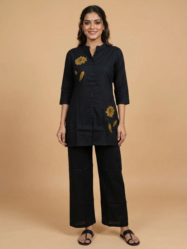 Black cotton co-ord set with mustard floral appliqué kurti and straight pants