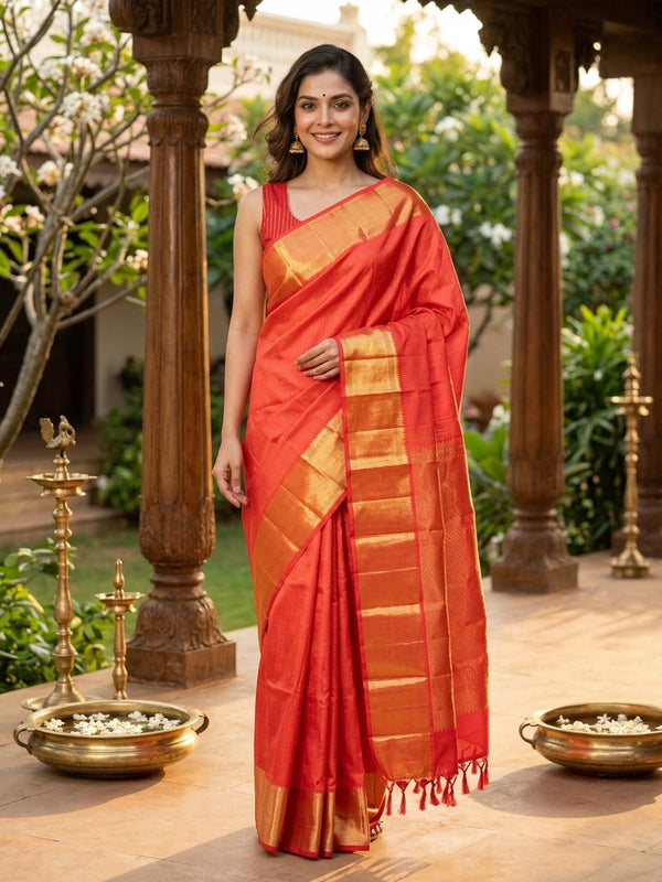 Red pure Kanchipuram silk saree with gold zari buti body, contrast temple-style gold border and paisley zari pallu