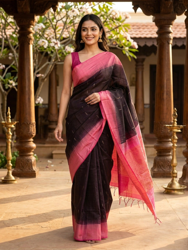 Deep wine soft silk saree with contrast pink zari border and tasselled pallu