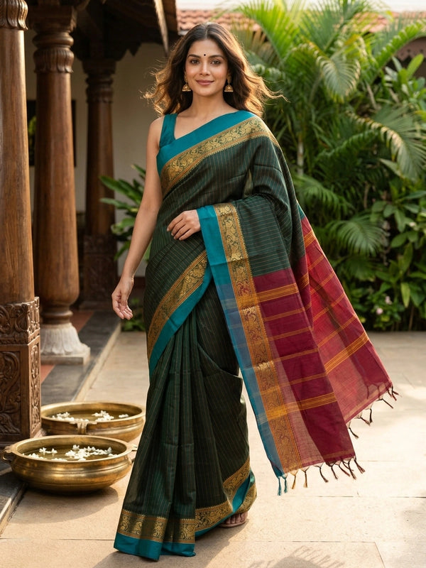 Bottle green Chettinad cotton saree with mustard pinstripes, teal gold zari border and maroon striped pallu