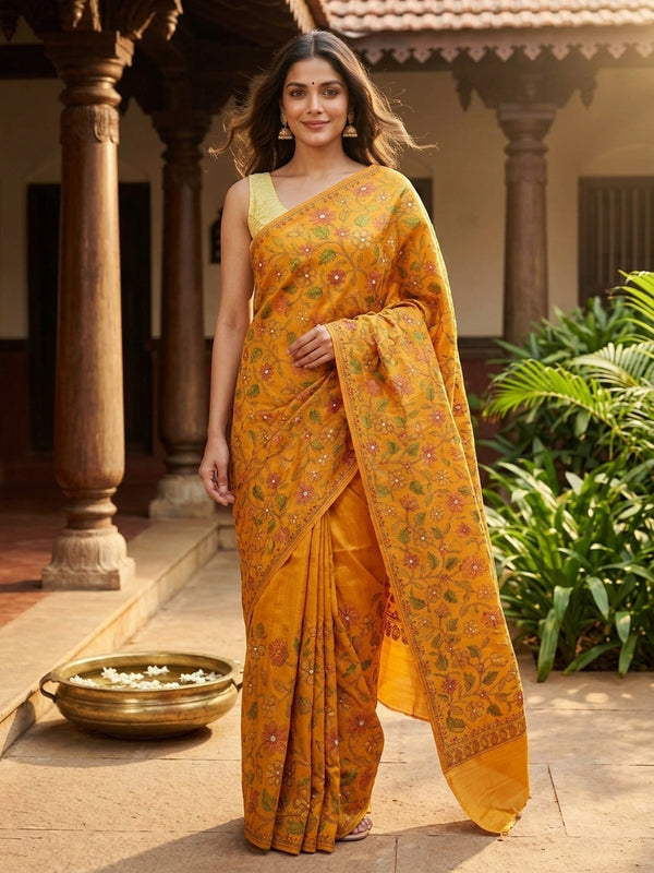 Mustard yellow semi tussar saree with allover multicolour floral embroidery and embroidered pallu