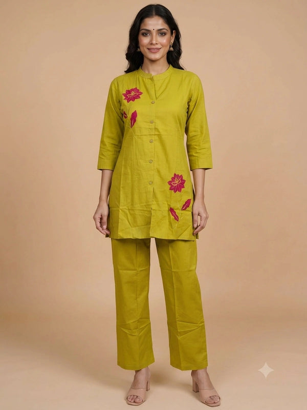 Lime green cotton co-ord kurti set with contrast pink floral embroidery and matching straight pants