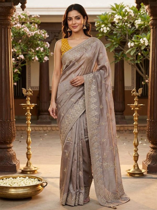 Mauve-grey shimmer designer saree with gold zari and sequin leaf embroidery and scalloped border