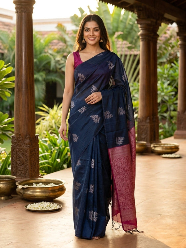 Navy blue silk cotton saree with silver butta motifs and contrast maroon pallu and border