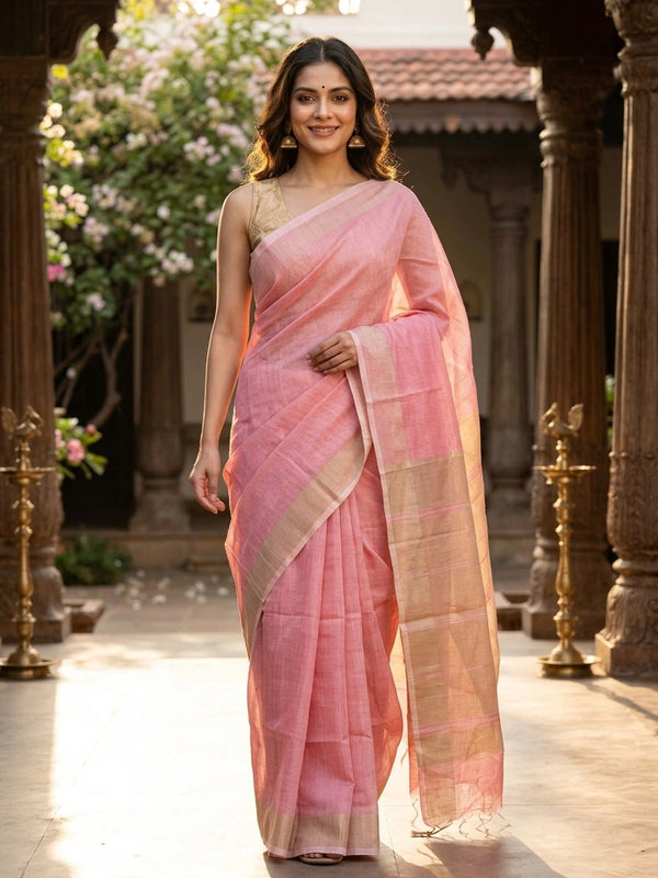 Pink and beige silk cotton saree with fine striped body, contrast beige pallu and golden-lined border