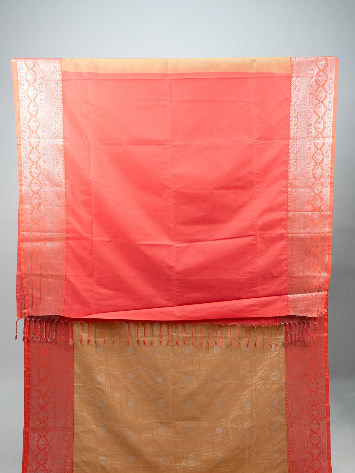 Beige semi silk saree with coral silver zari border and Vaira Oosi Design woven buttas