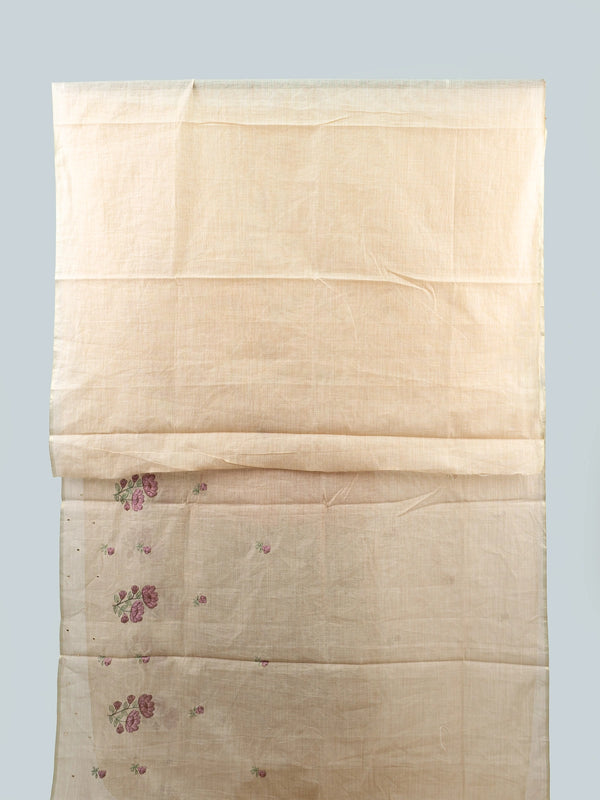 Cream linen cotton saree with mauve floral embroidery, fine zari border and tasseled pallu